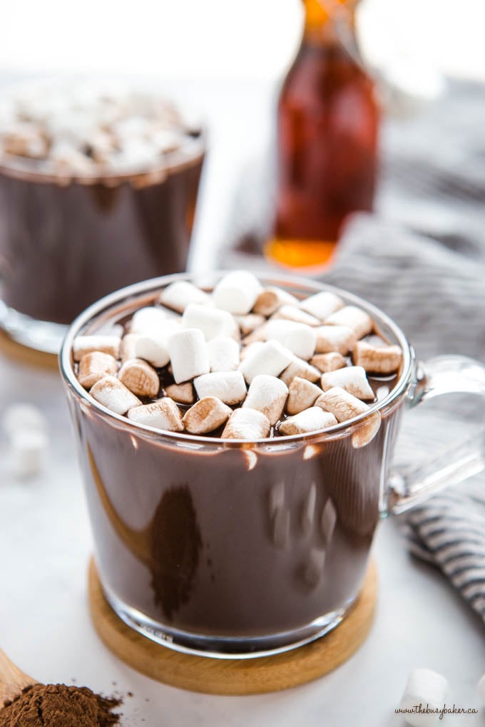 vegan hot chocolate in glass mug with vegan marshmallows