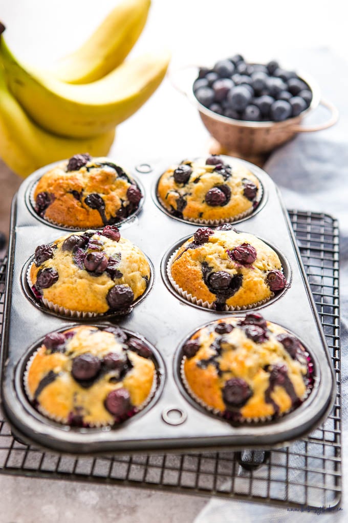 banana blueberry muffins in muffin tin