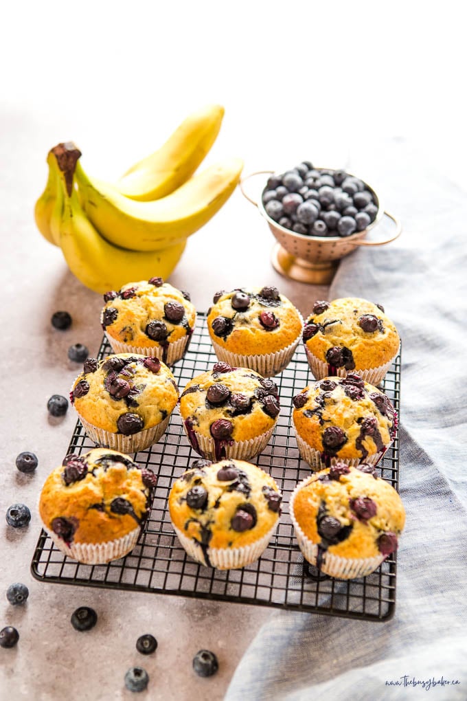 banana blueberry muffins on wire cooling rack