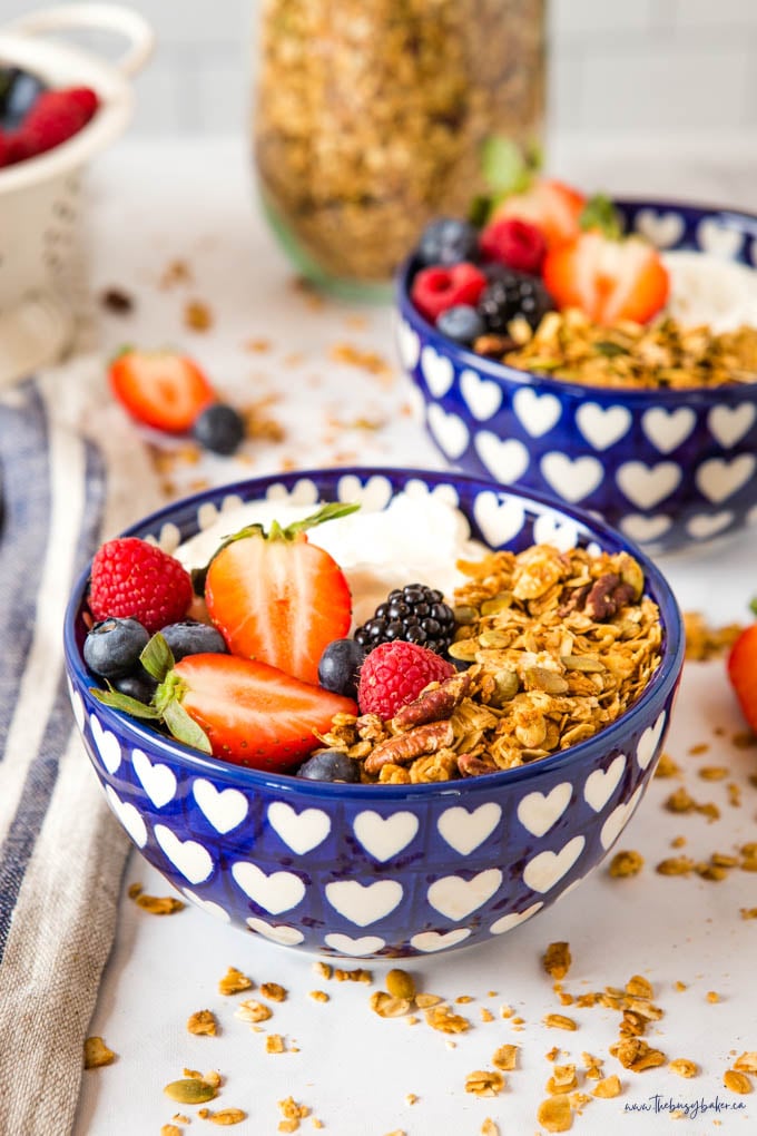 beautiful polish ceramic bowl with hearts, containing granola, yogurt and berries