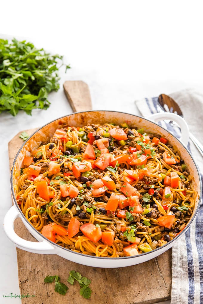 white cast iron pan with taco spaghetti