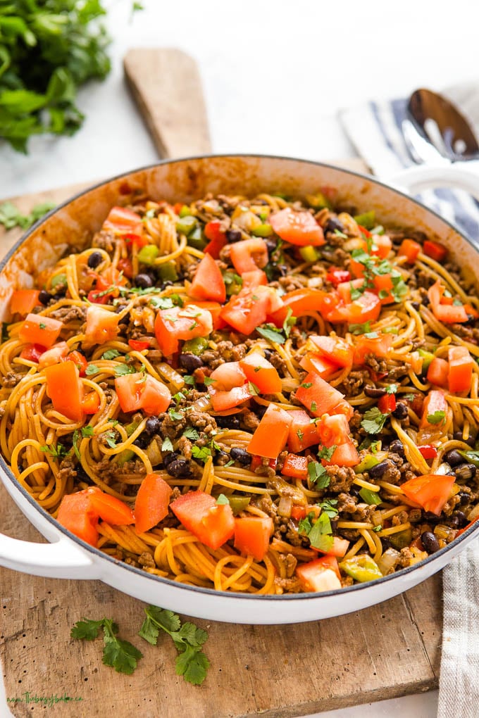 white cast iron pan with taco spaghetti