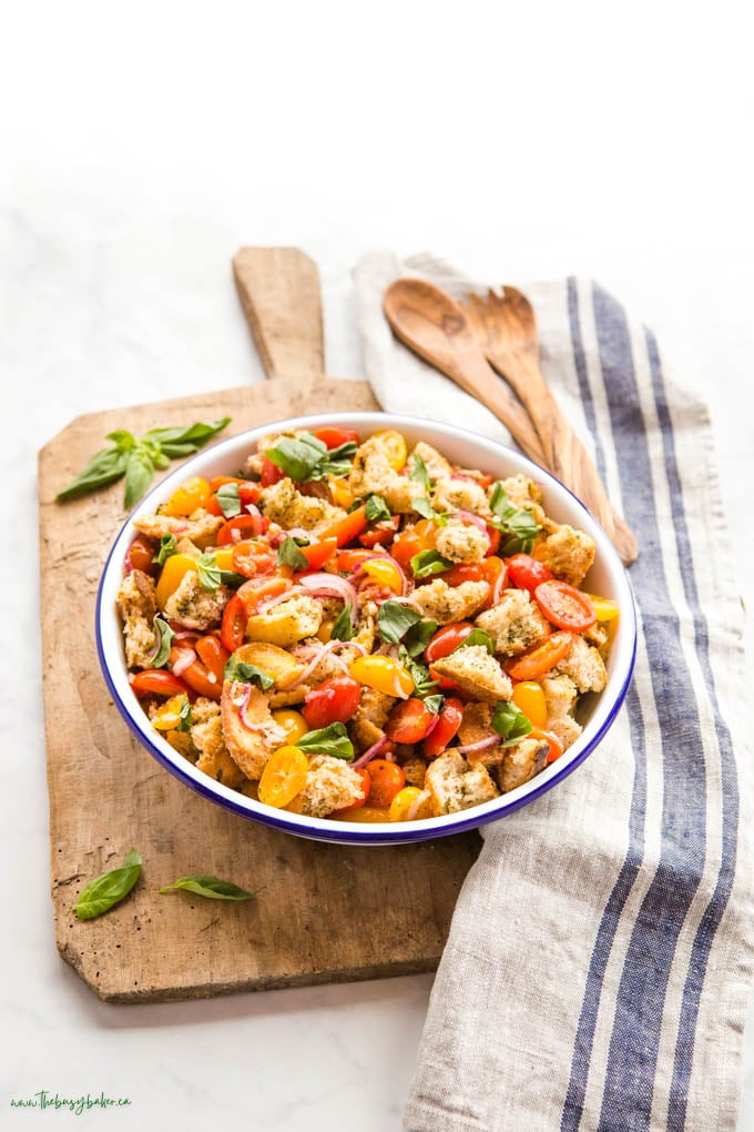 Italian bread salad in white enamel bowl