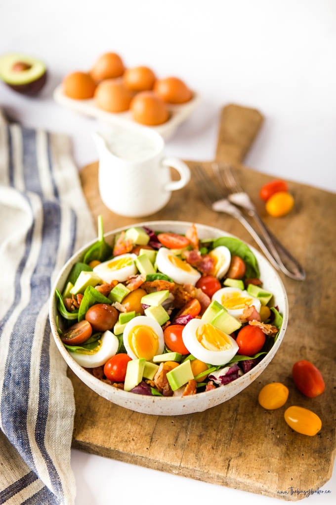 chef's salad with egg, bacon, avocado, and tomatoes