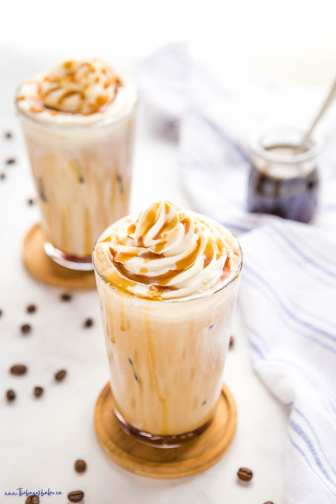iced caramel latte in glass with ice and caramel sauce