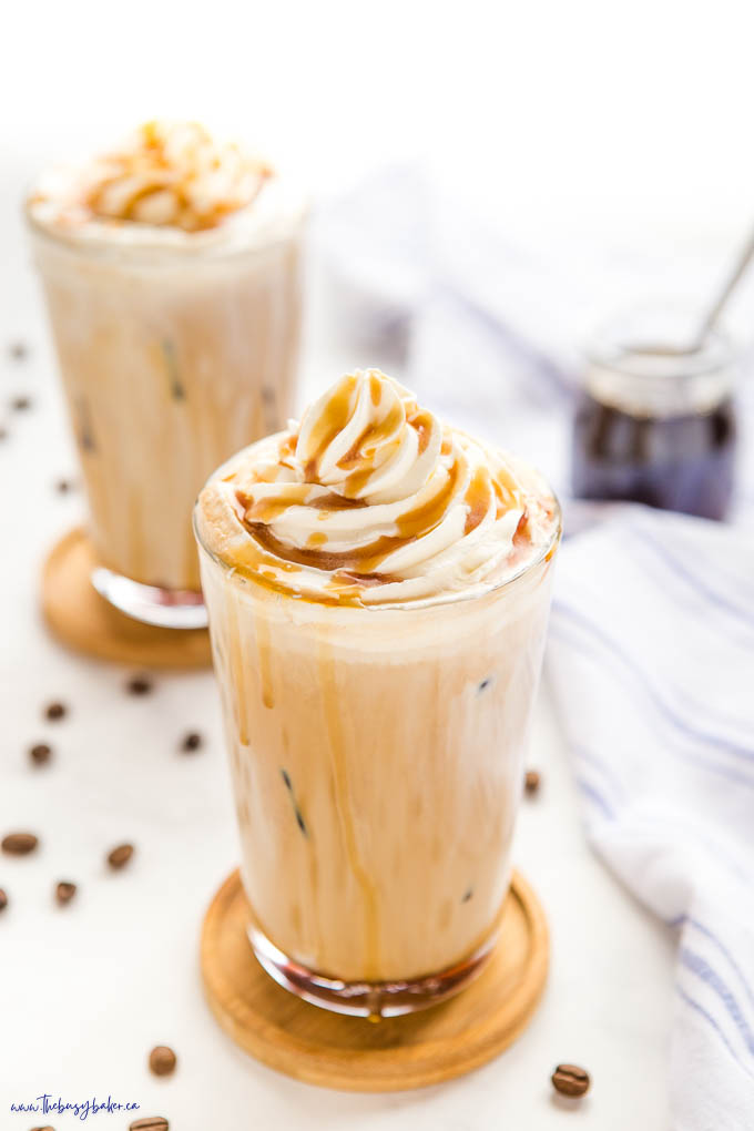 iced caramel latte with whipped cream and caramel sauce