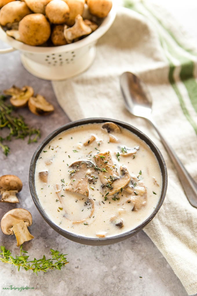 black ceramic bowl with homemade mushroom soup