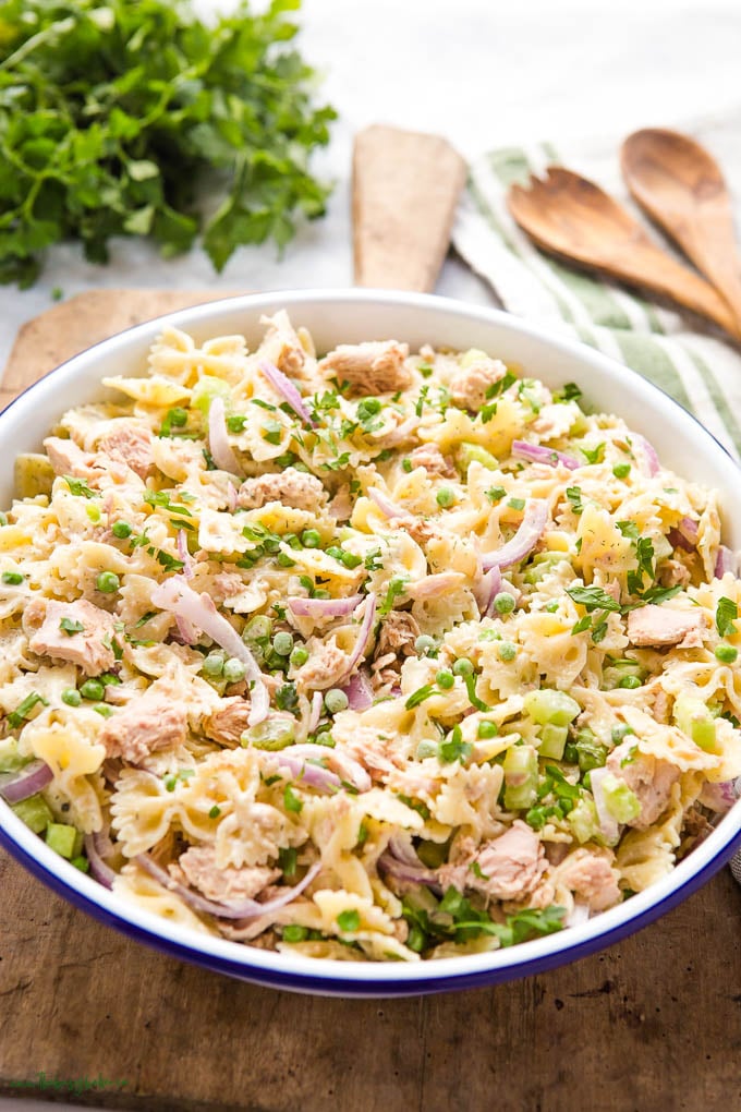 close up image of tuna salad in a blue rimmed bowl