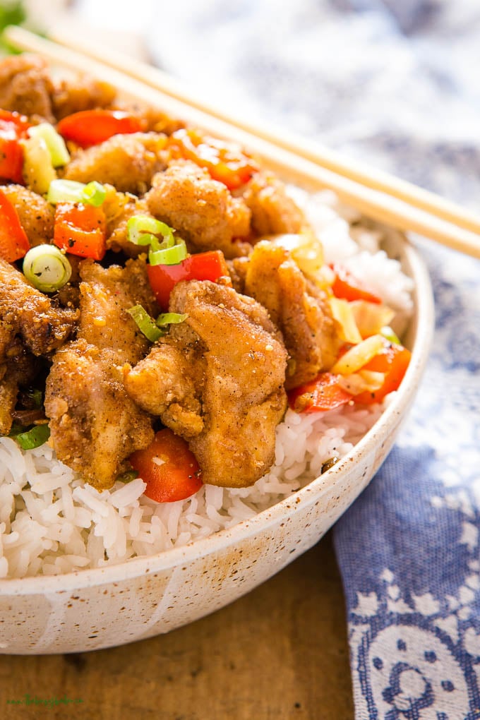 crispy salt and pepper chicken over rice