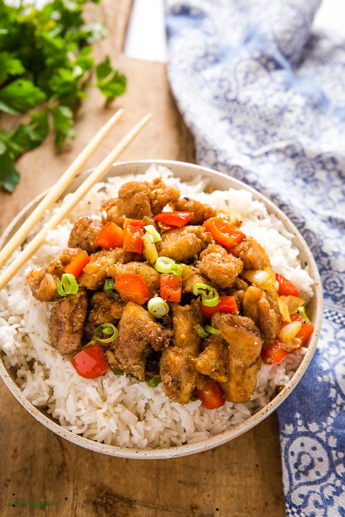 bowl of rice with salt and pepper chicken