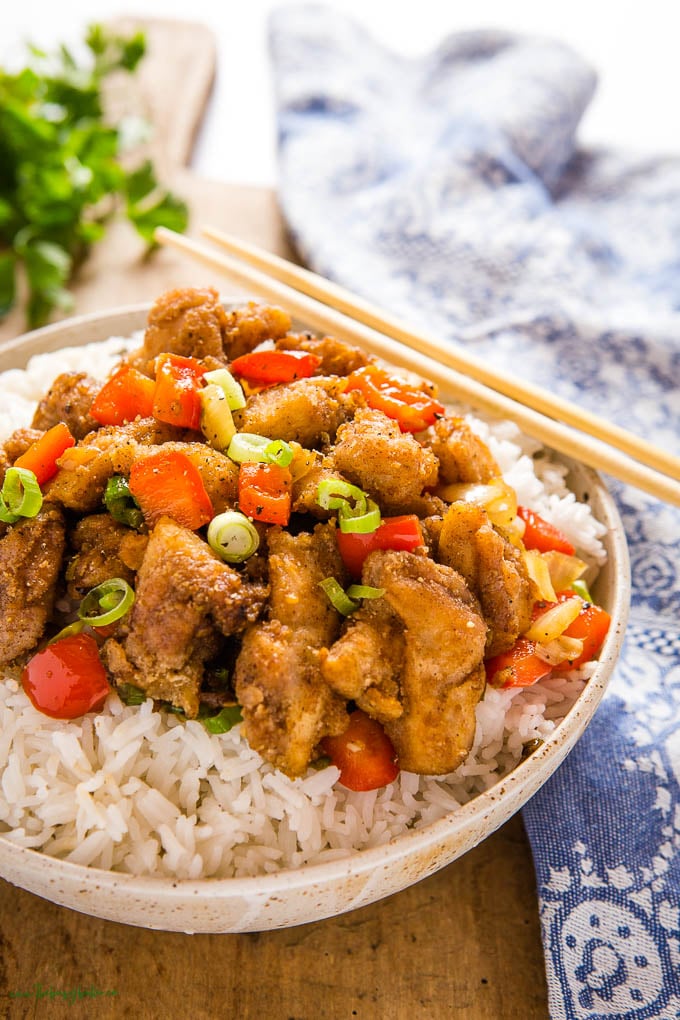 bowl of rice with salt and pepper chicken