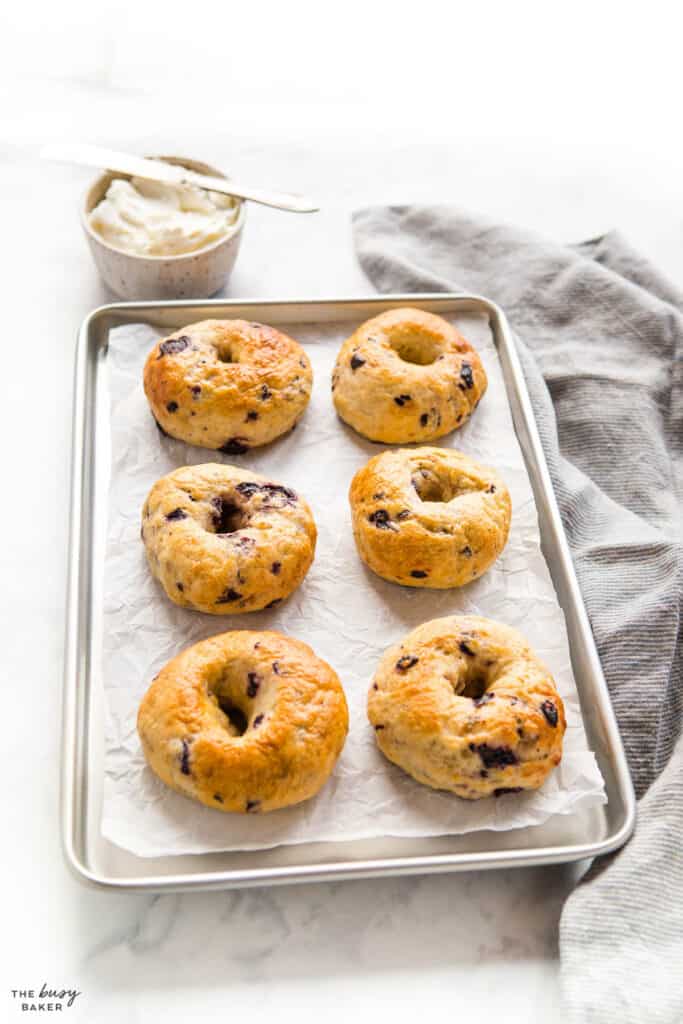 bagels on sheet pan with blueberries