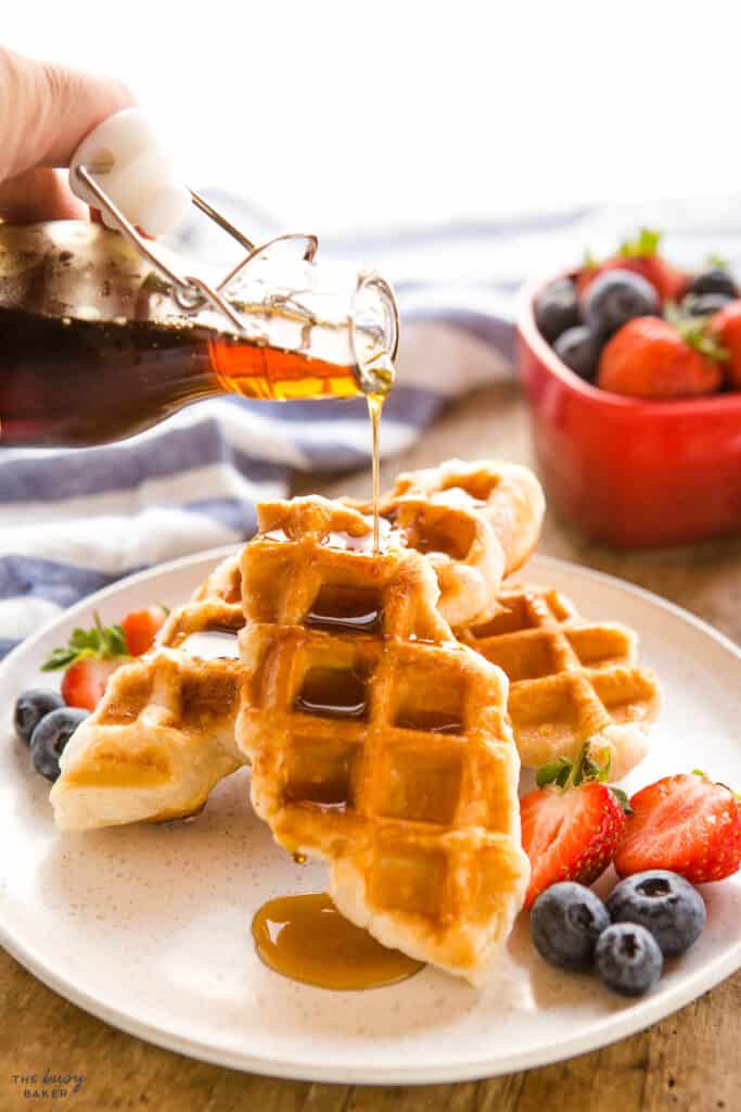 croissant waffles with maple syrup and fruit