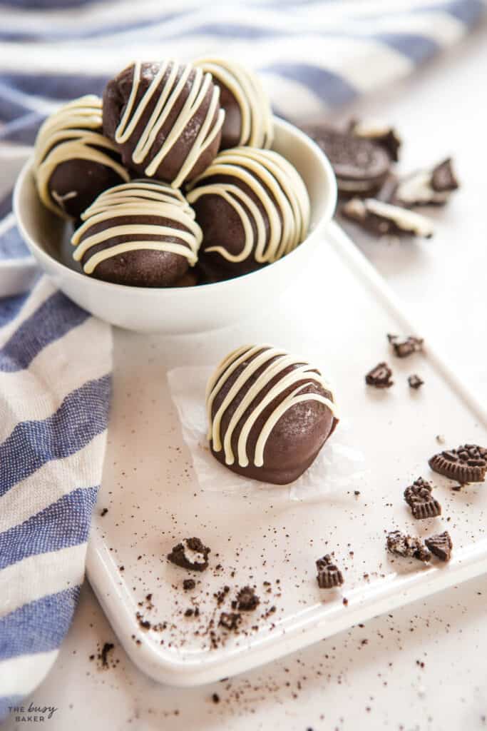 Oreo truffles in bowl with white chocolate
