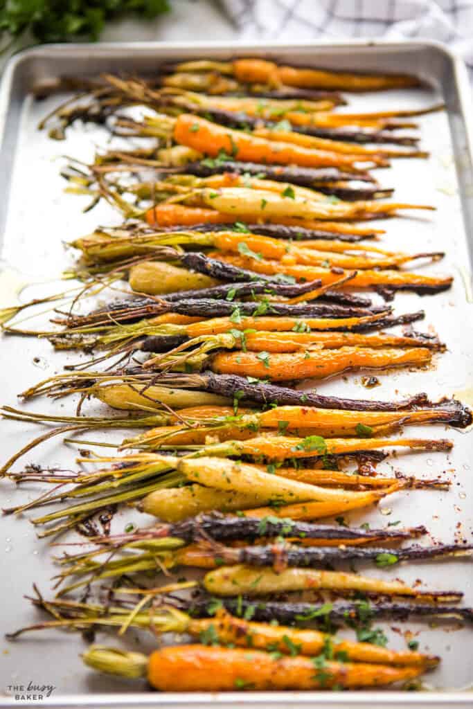 multicoloured root vegetables on sheet pan