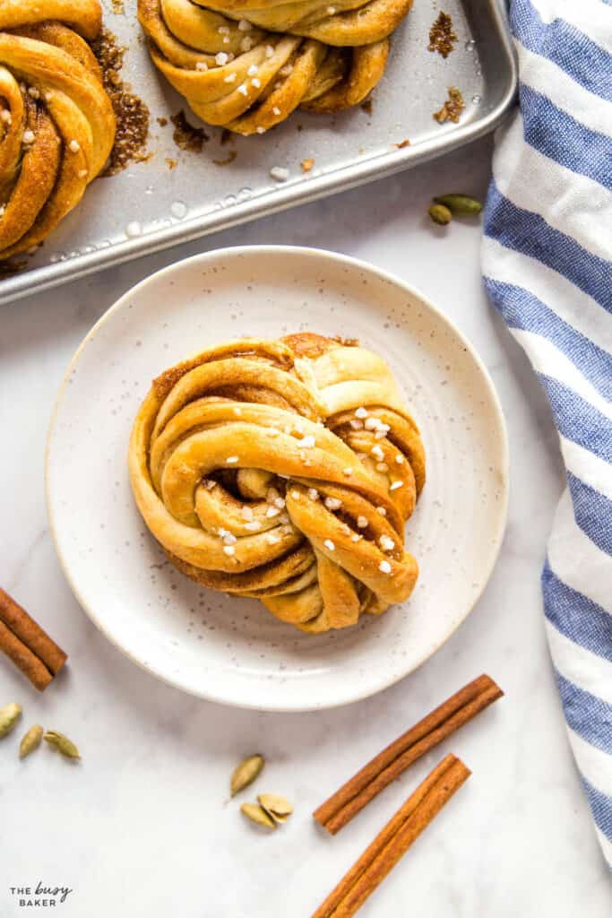 overhead image kanelbullar cinnamon twist with pearl sugar