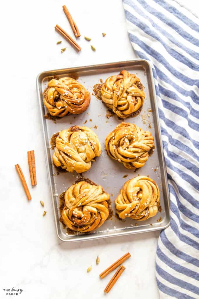 overhead image: swedish cinnamon buns on baking sheet
