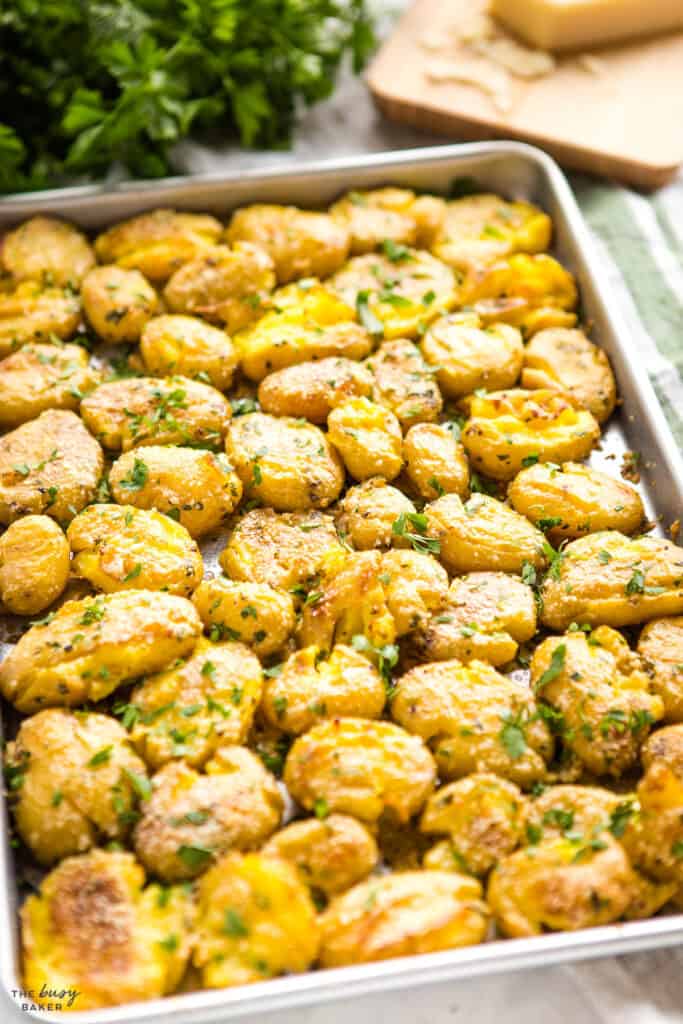 potatoes on sheet pan with crispy parmesan