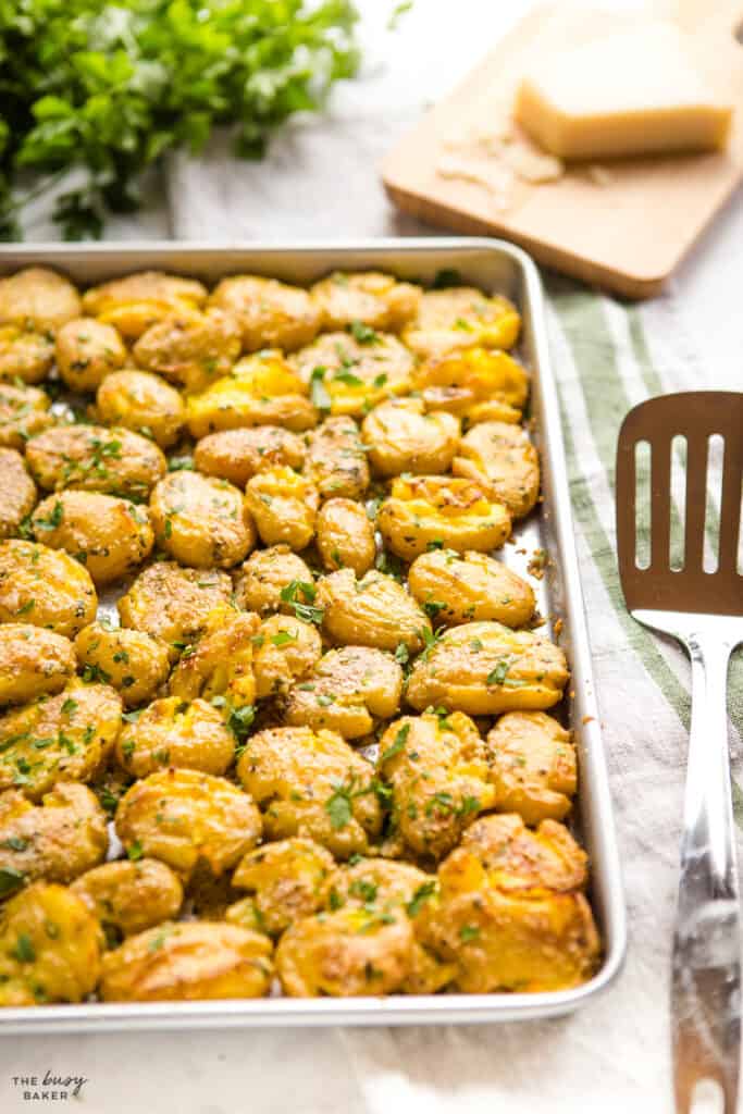 sheet pan with crispy parmesan smashed potato side dish