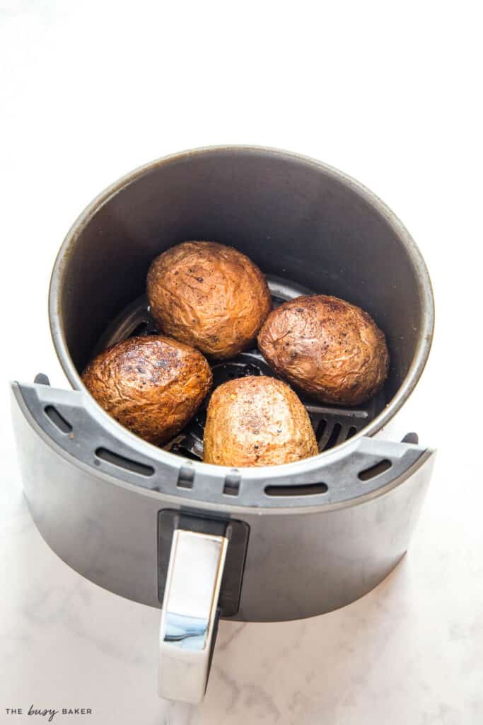 4 baked potatoes in the air fryer with crispy skin