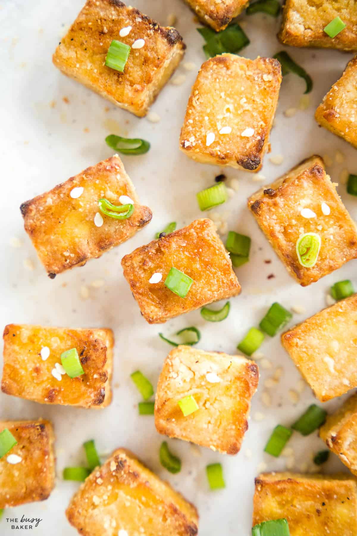 crispy tofu with sesame seeds and green onions