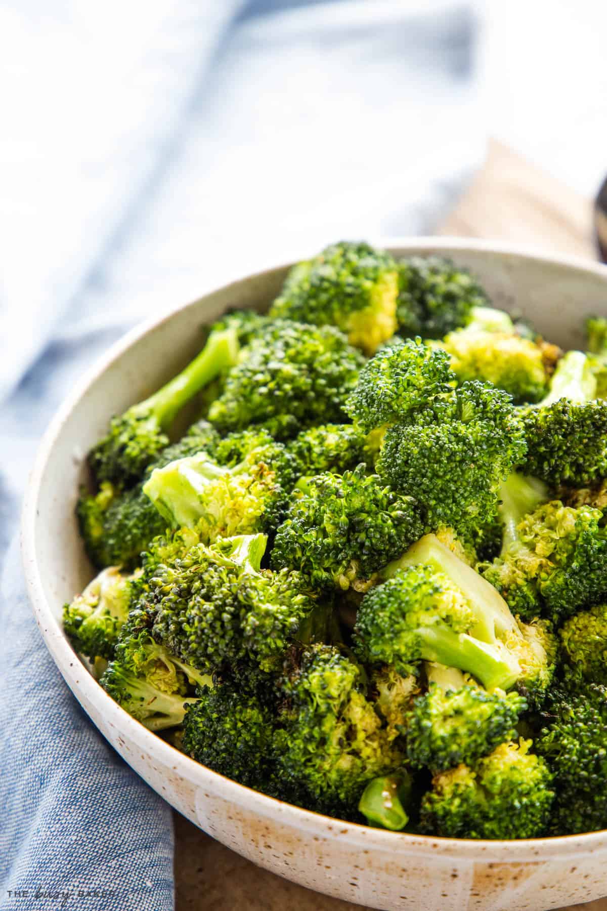 closeup image: air fryer broccoli in bowl