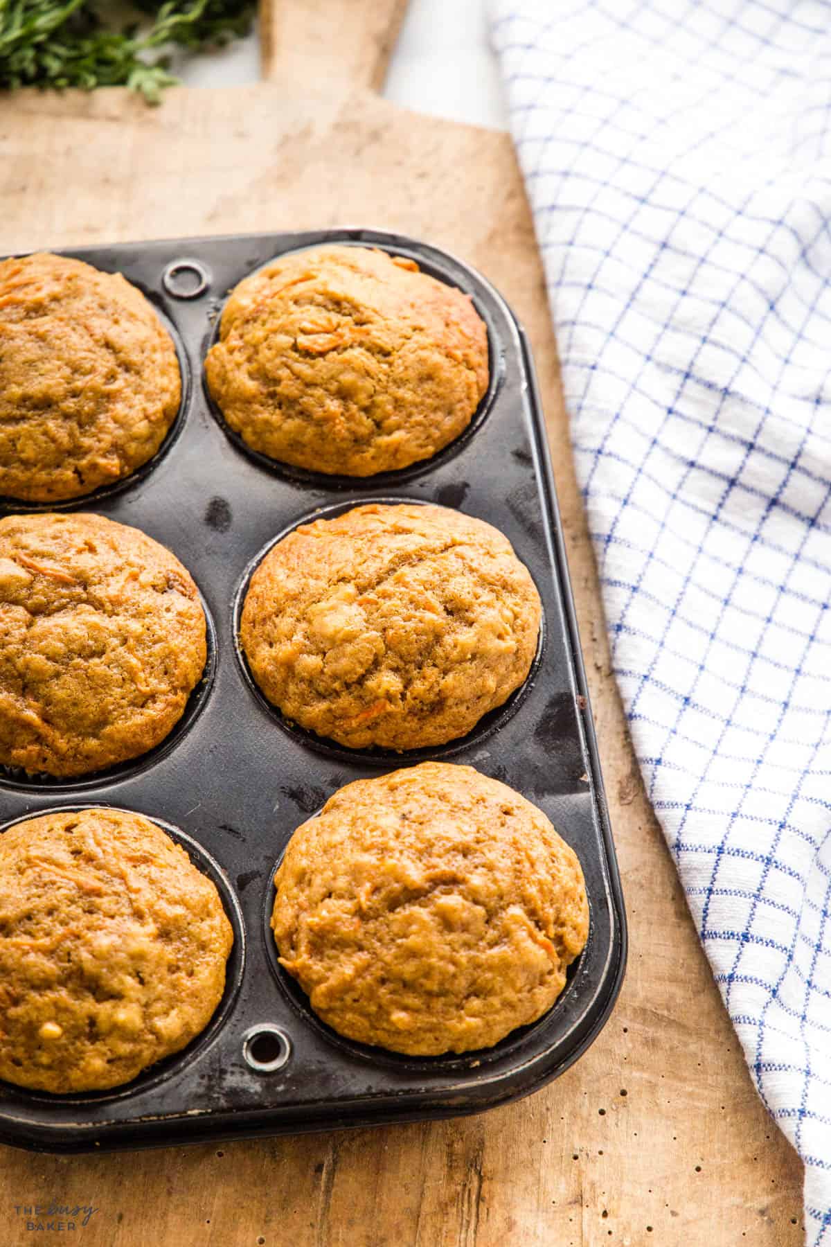 carrot cake muffins in muffin pan