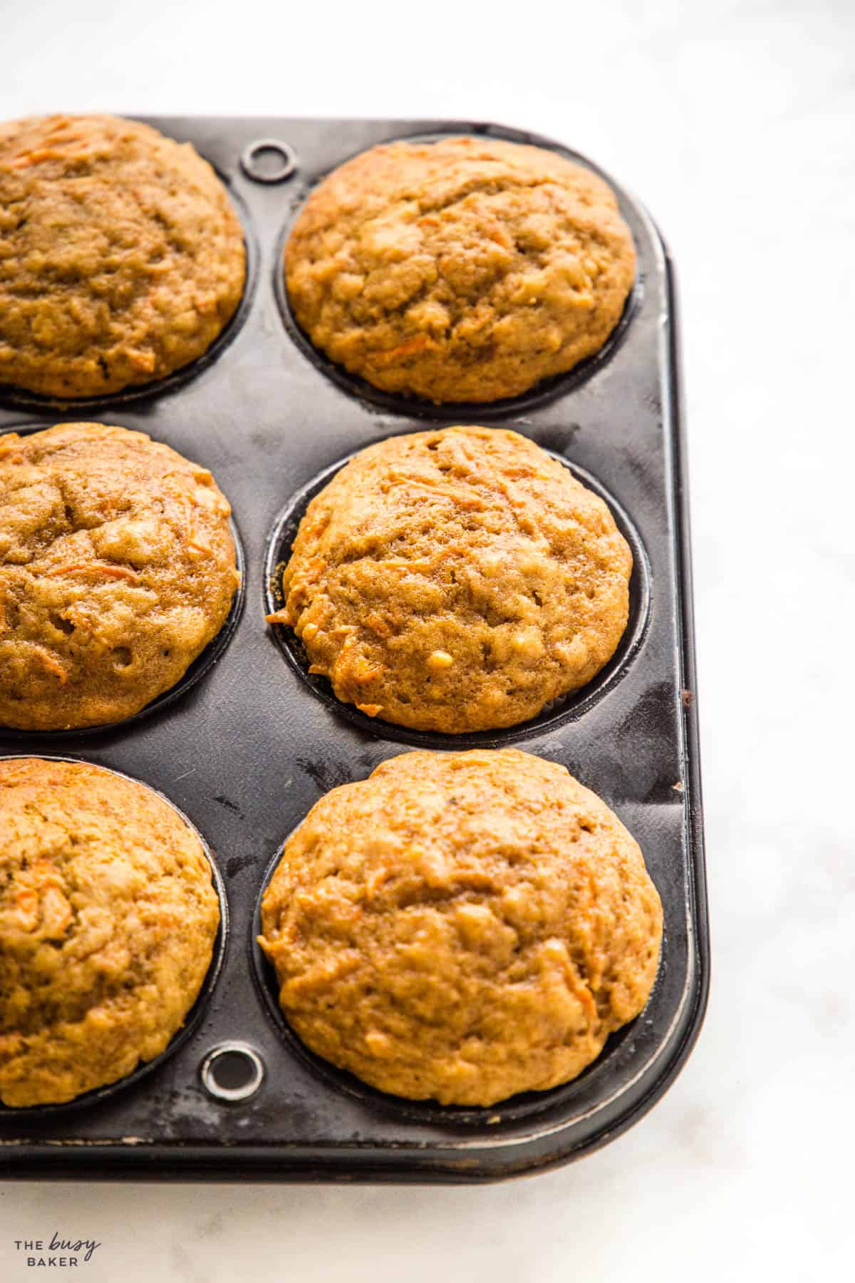muffin pan with muffins