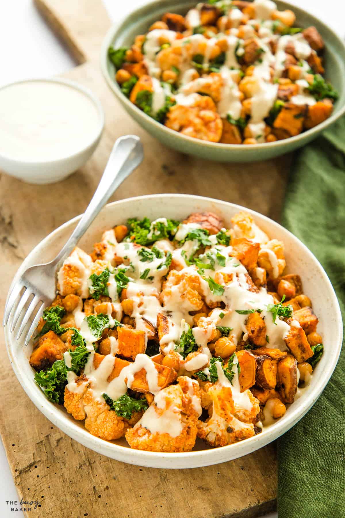 cauliflower with kale, sweet potatoes and chickpeas
