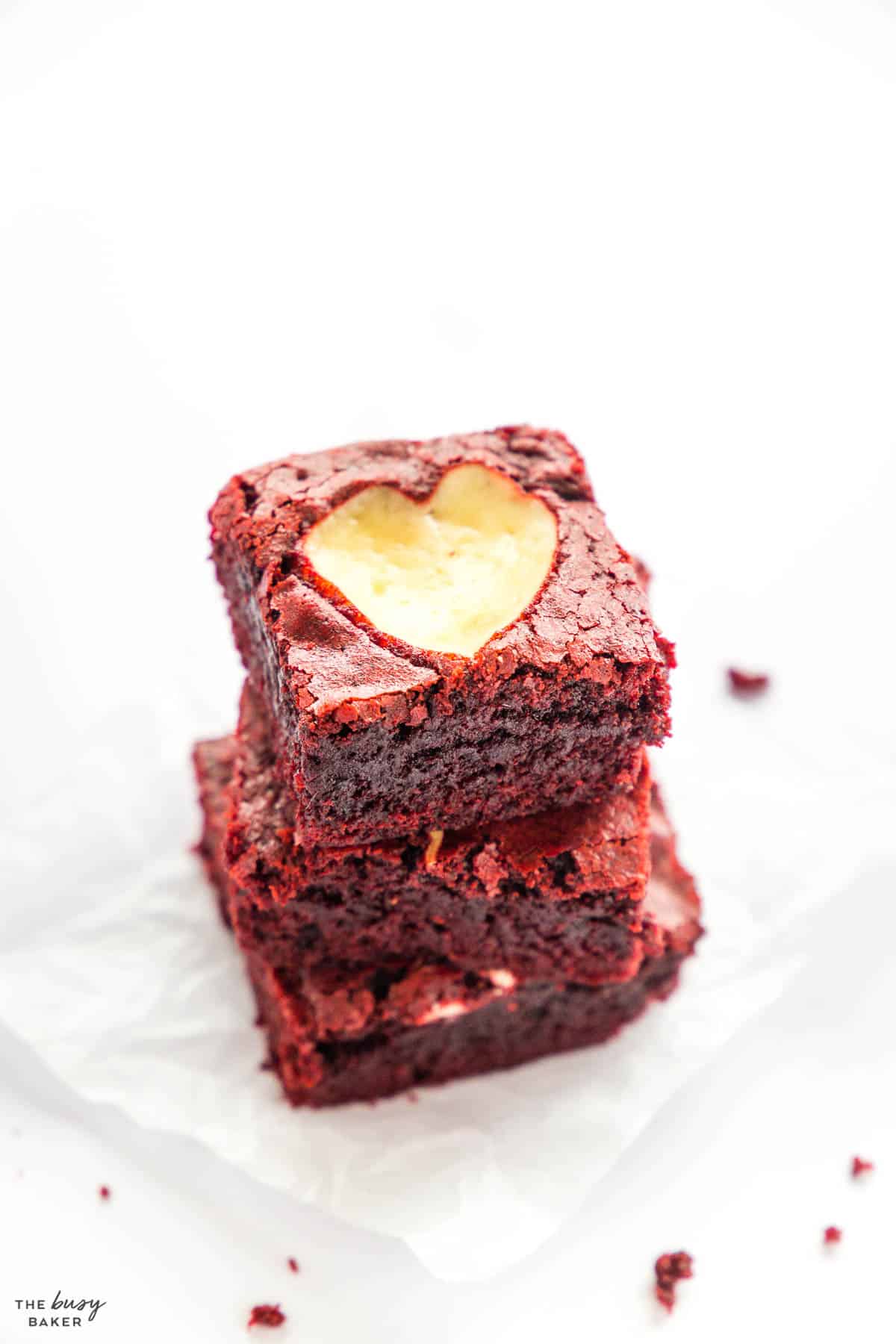 stack of red velvet brownies with hearts