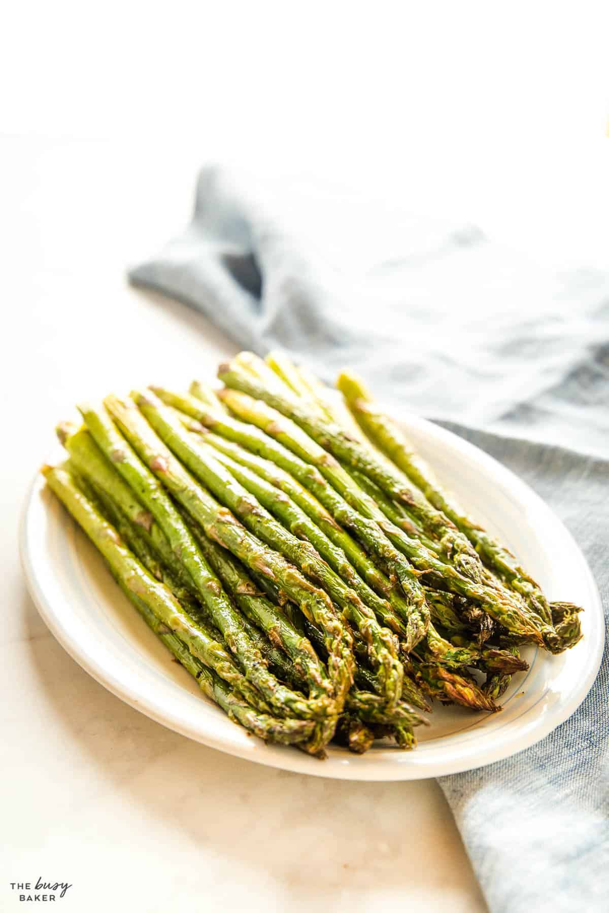 air fryer asparagus on white platter