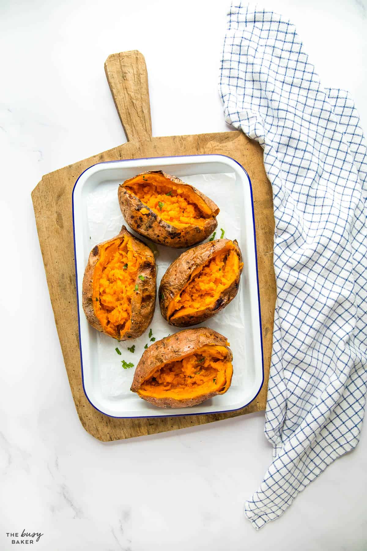 baked sweet potatoes on white tray