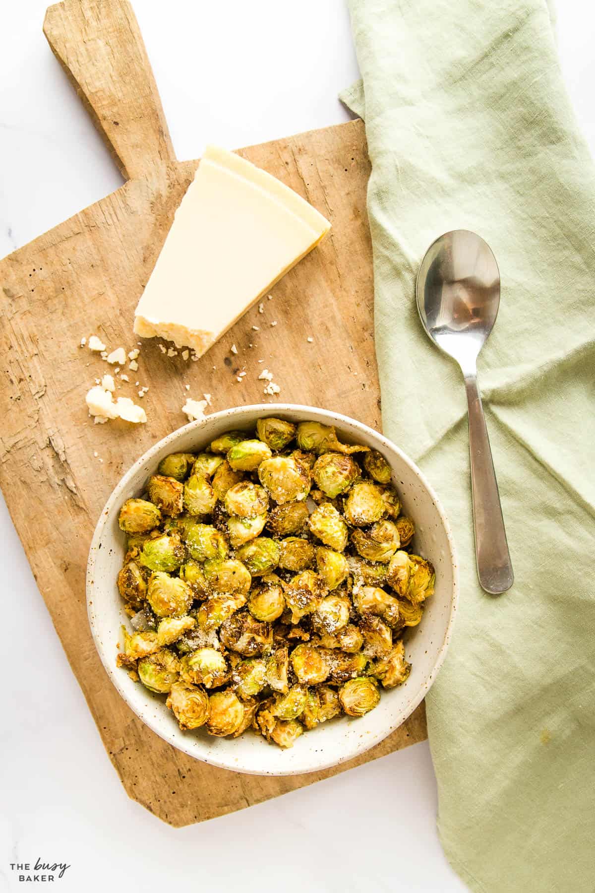air fryer brussels sprouts in bowl with parmesan