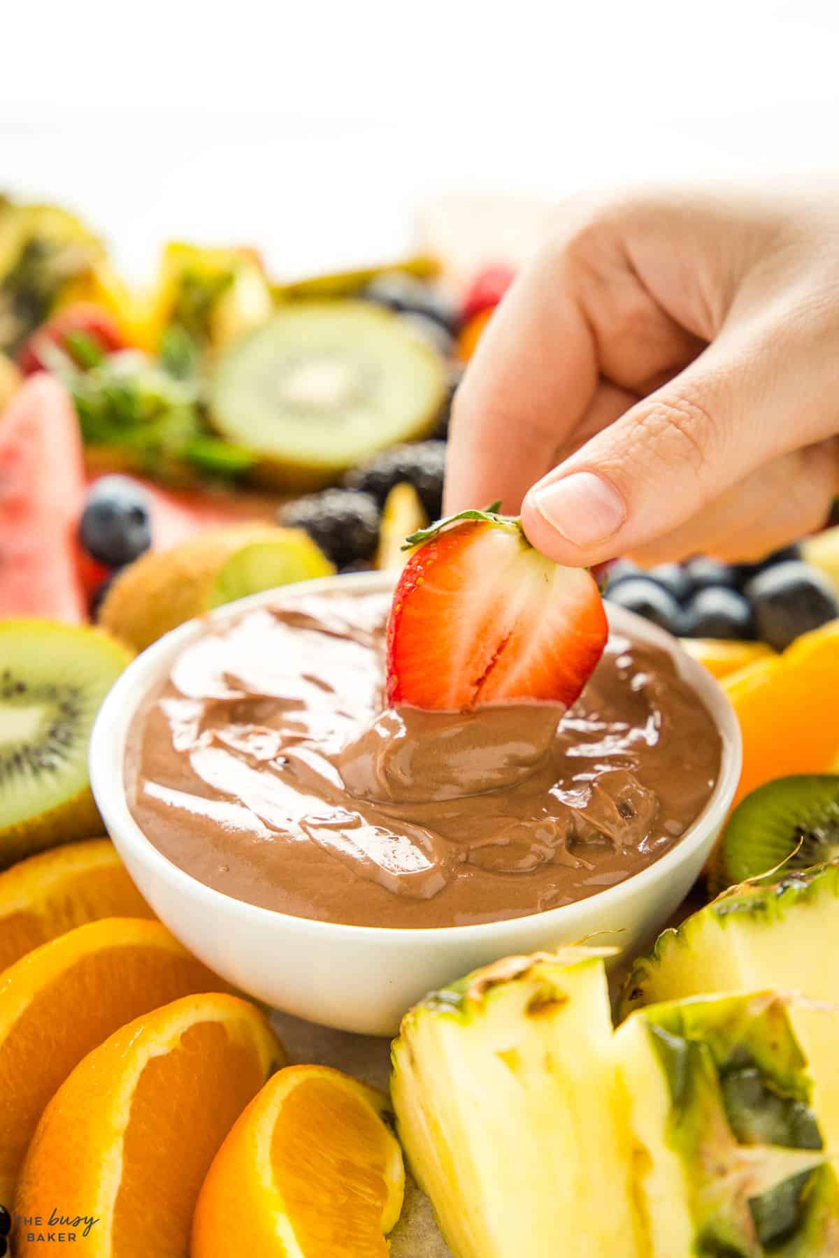 strawberry dipping in chocolate