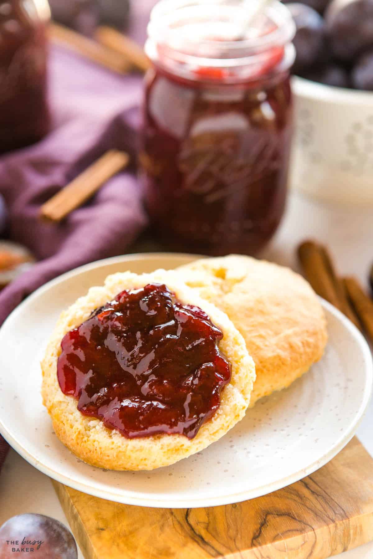 homemade plum jam spread on a homemade scone