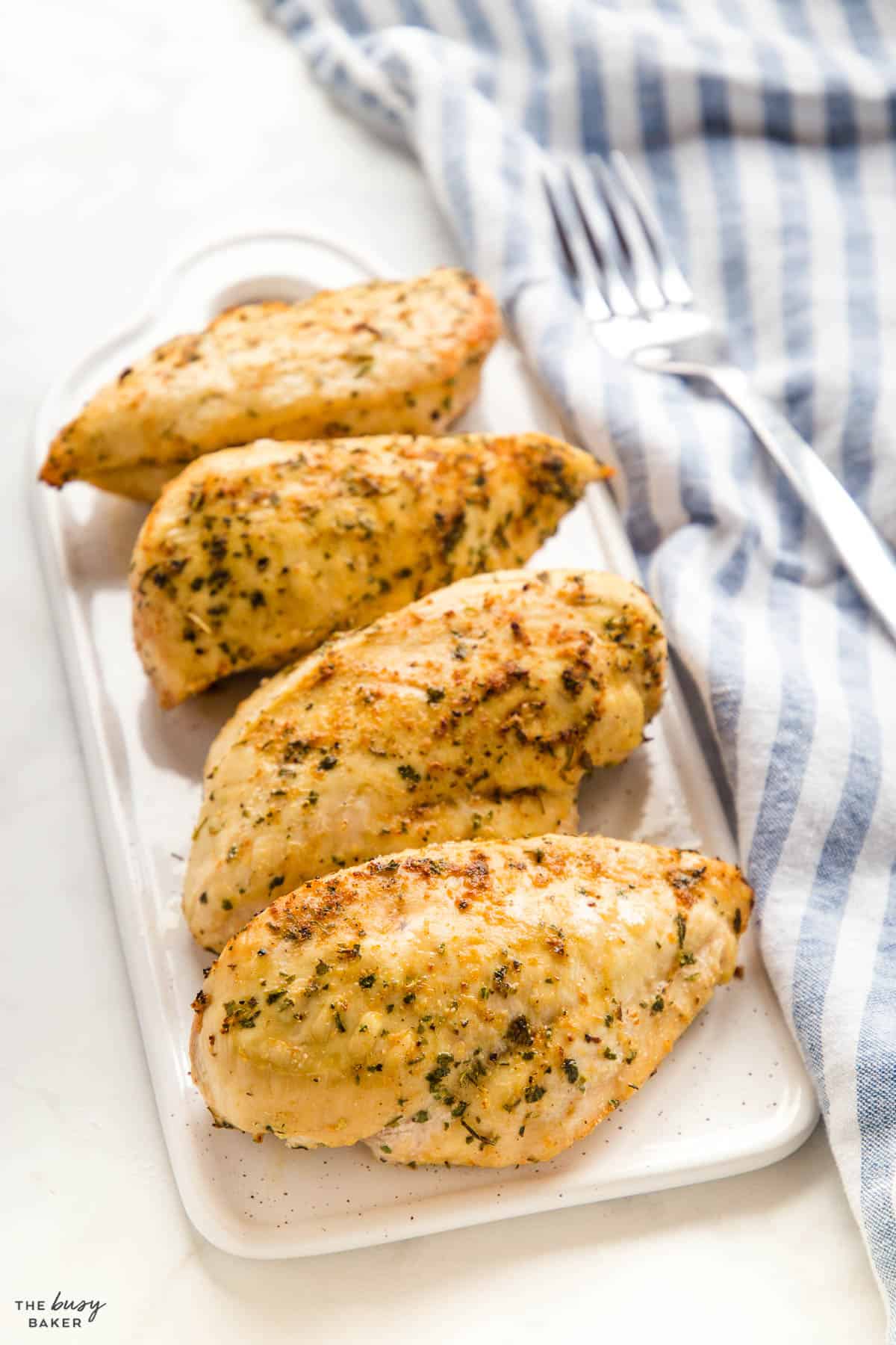 air fryer chicken breasts on white platter