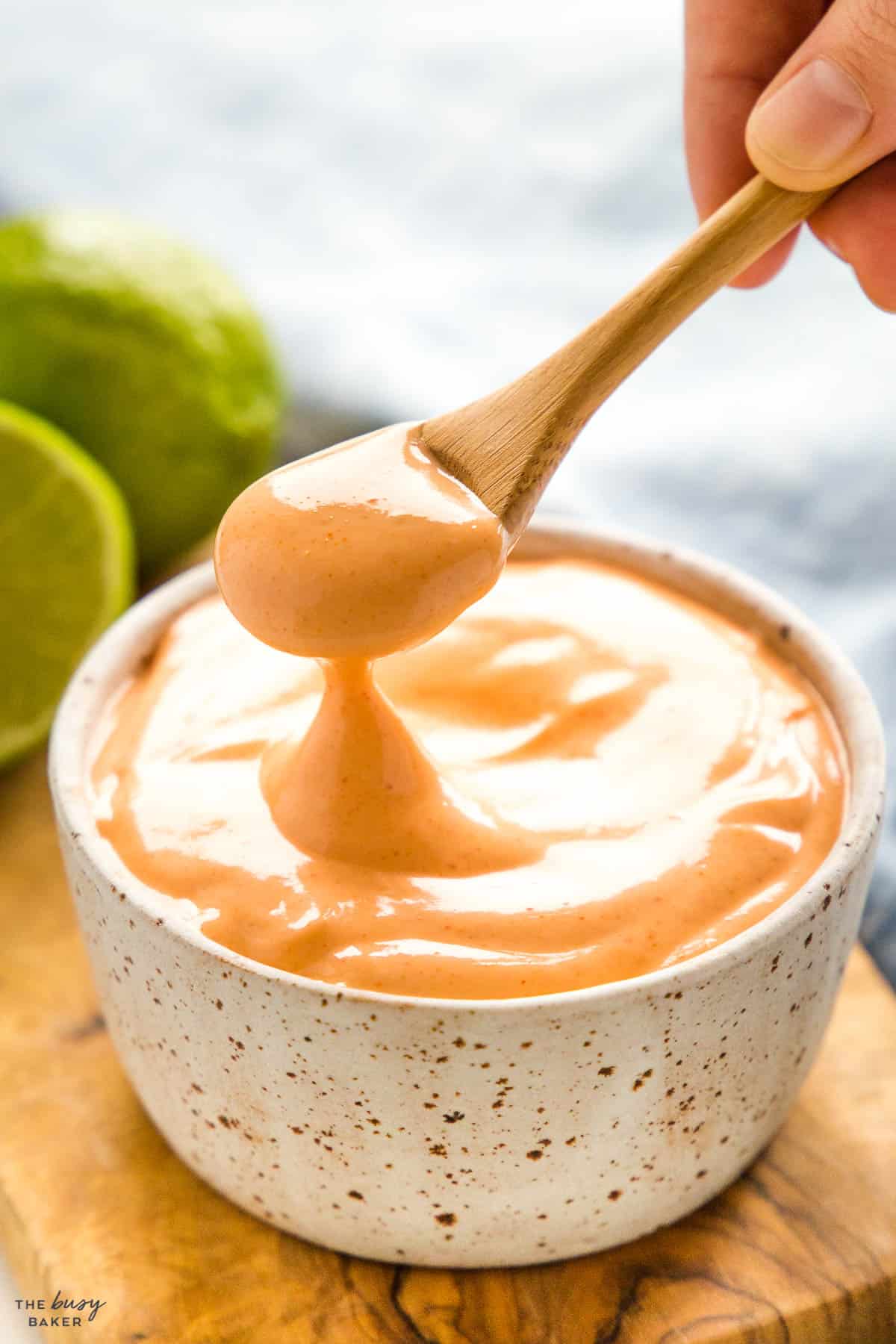 spoonful of creamy mayonnaise with hot sauce