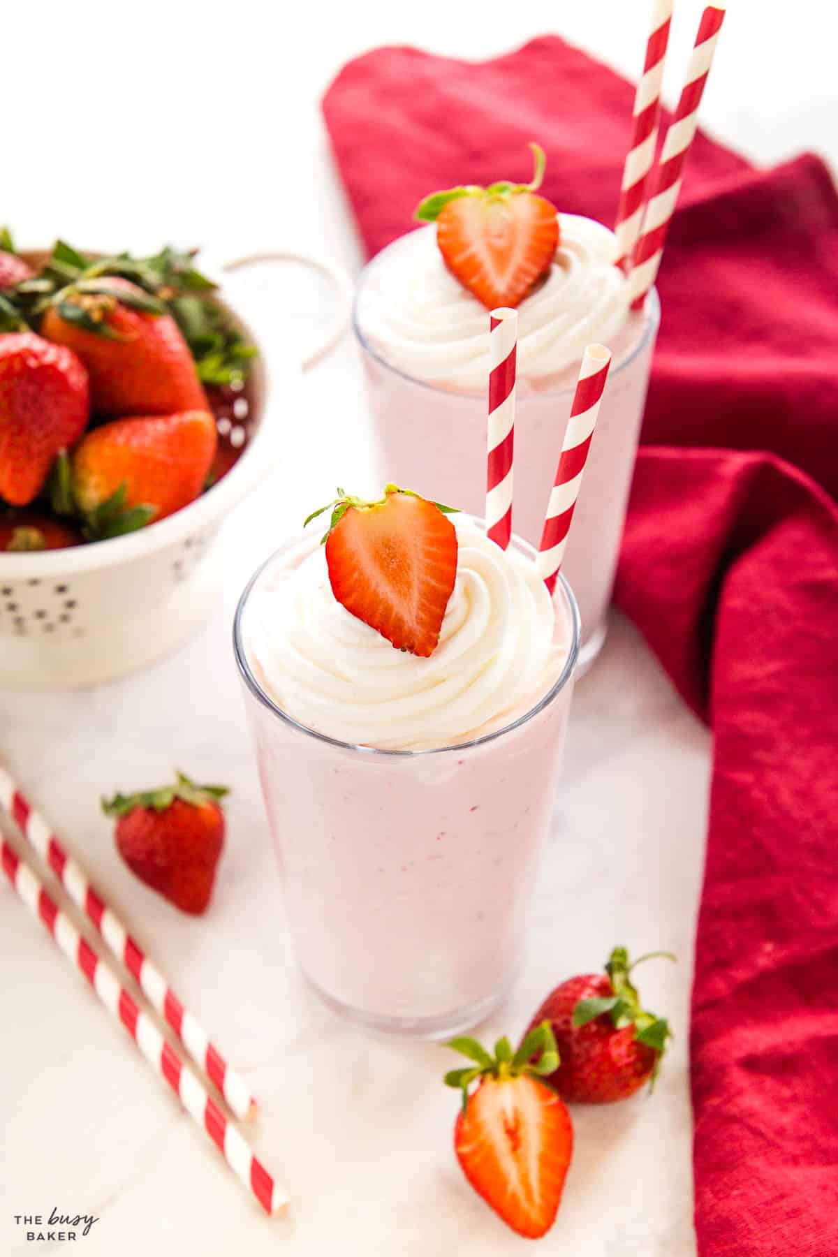 strawberry milkshake in a tall glass