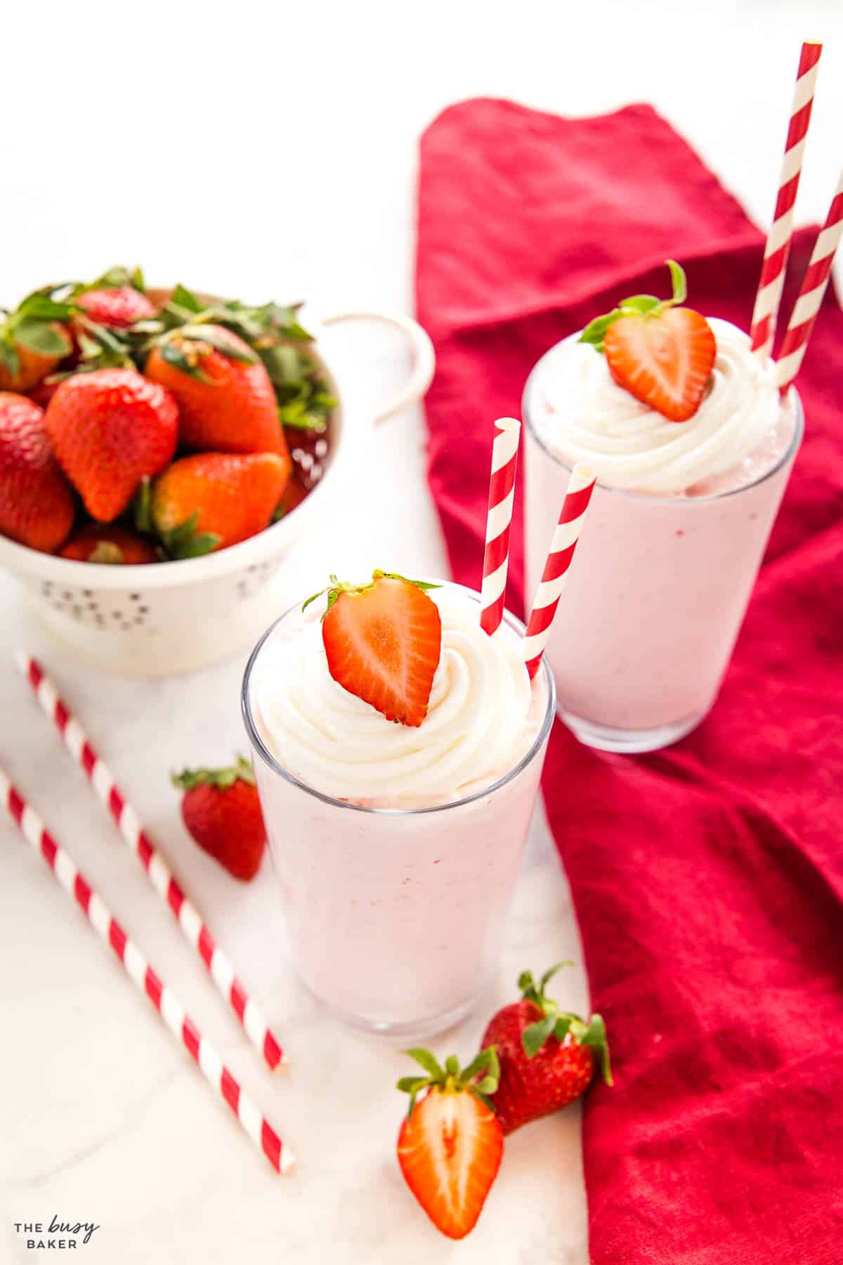 berry ice cream drink with fresh berries and whipped cream