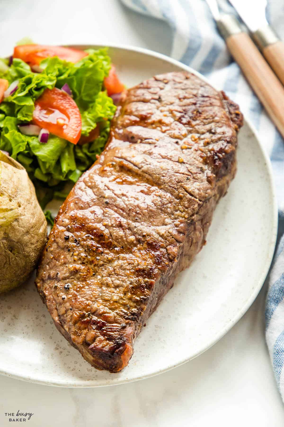 grilled sirloin steak on plate
