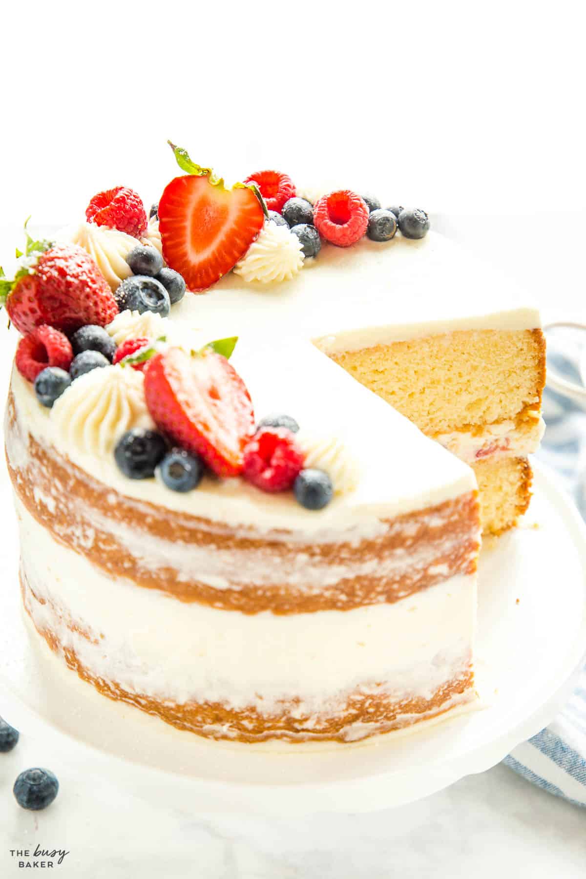 homemade naked cake with fruit on top
