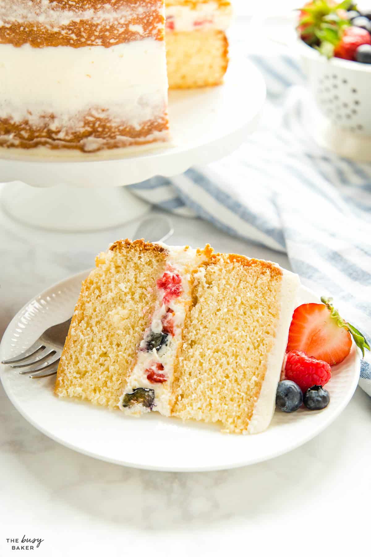 slice of white cake with berries