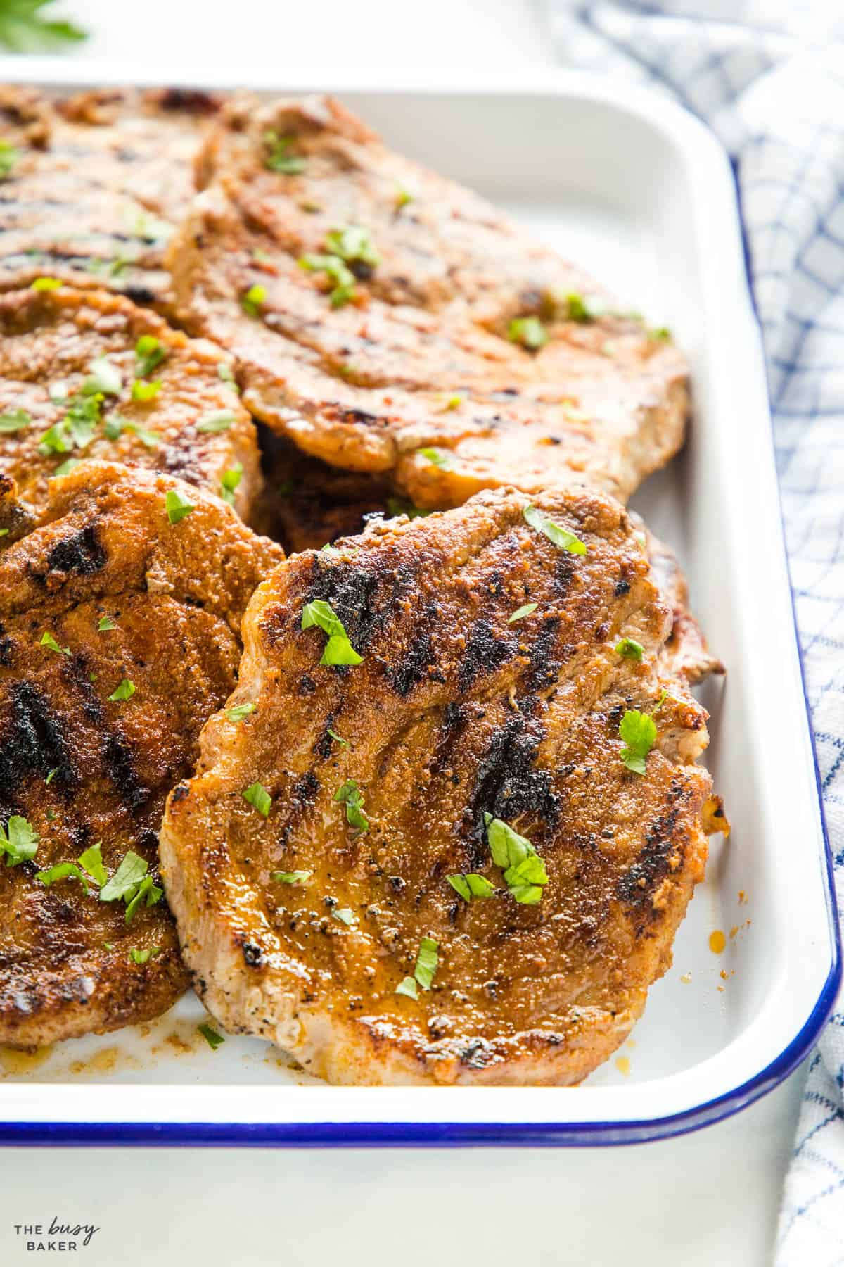 grilled pork steaks on a tray