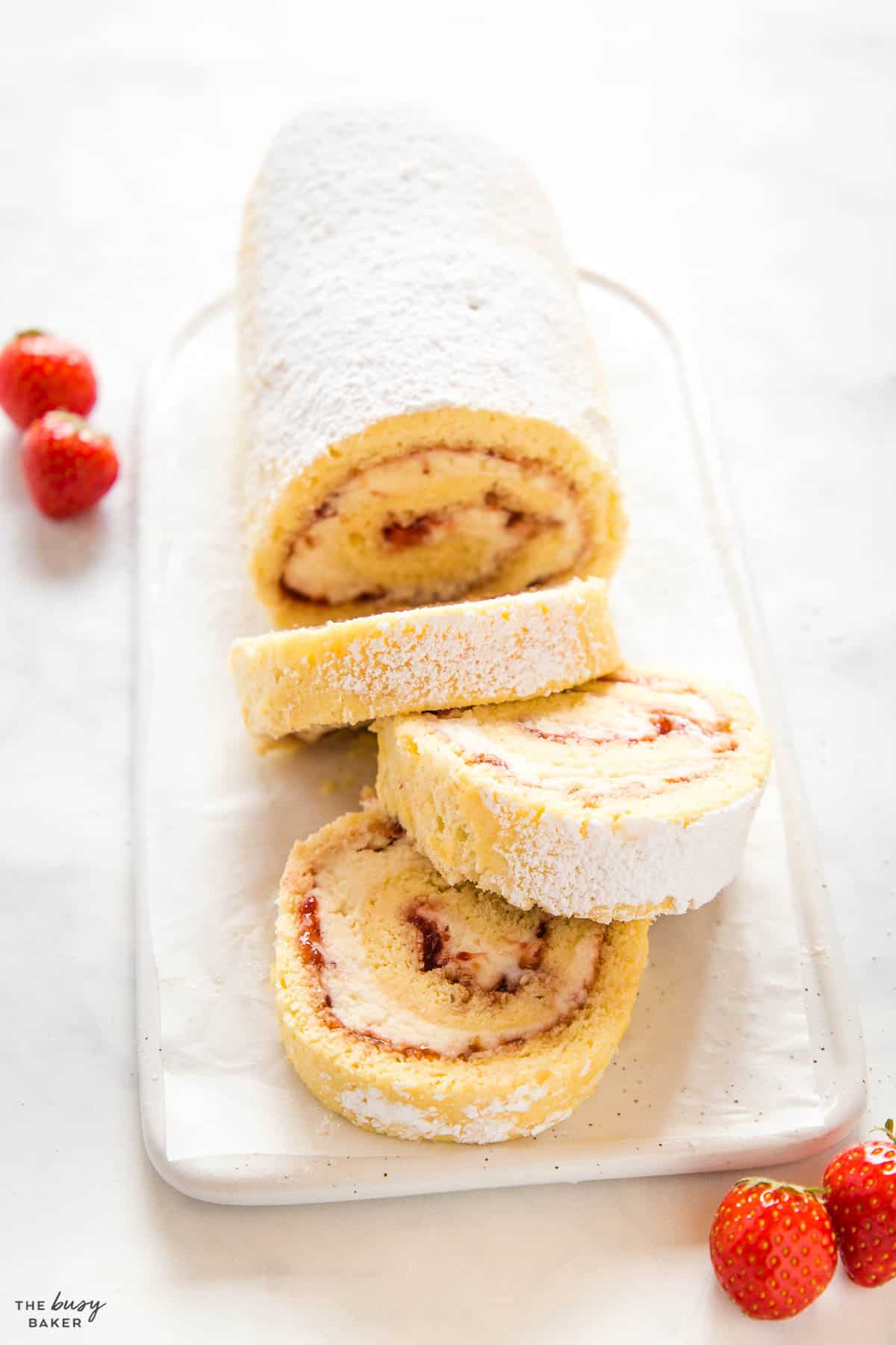 swiss roll cake with strawberry jam and cream