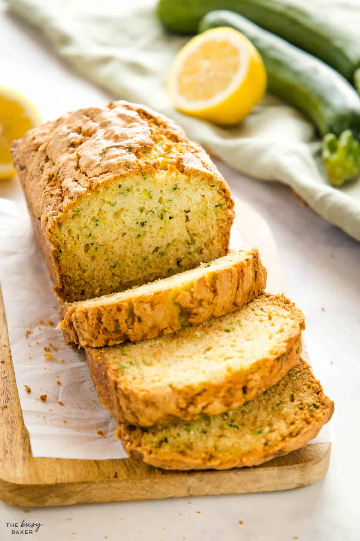 zucchini loaf sliced on a cutting board