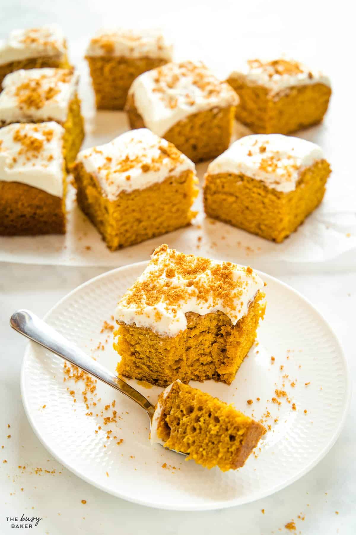 piece of pumpkin cake with cream cheese frosting