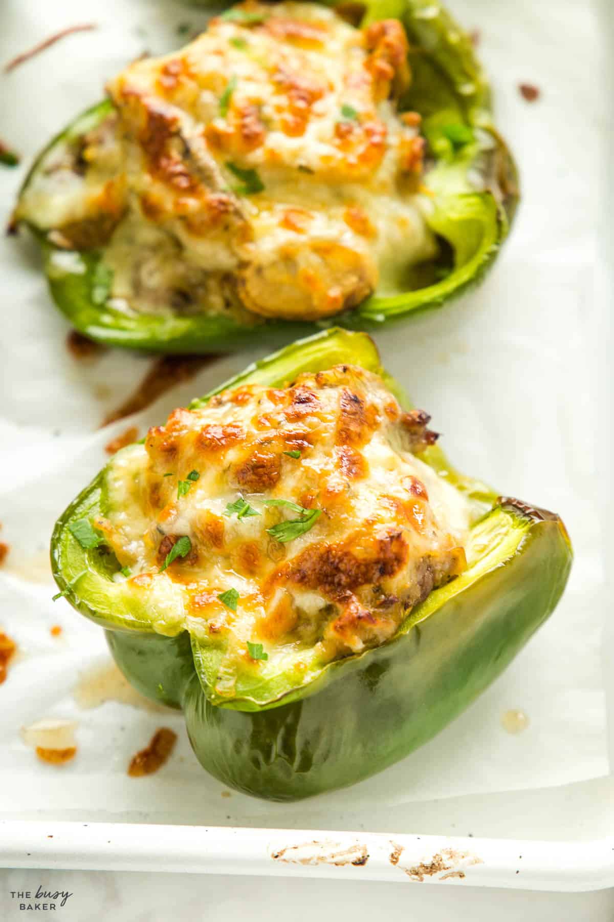 closeup image: green pepper with steak and cheese filling