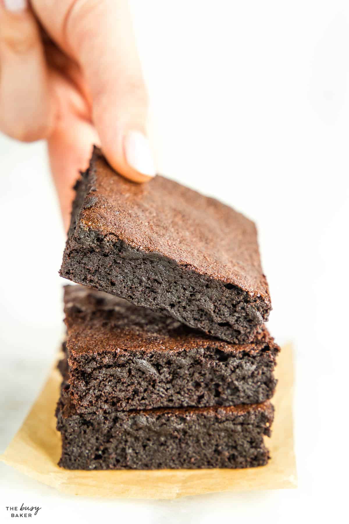 closeup image: stack of fudgy brownies