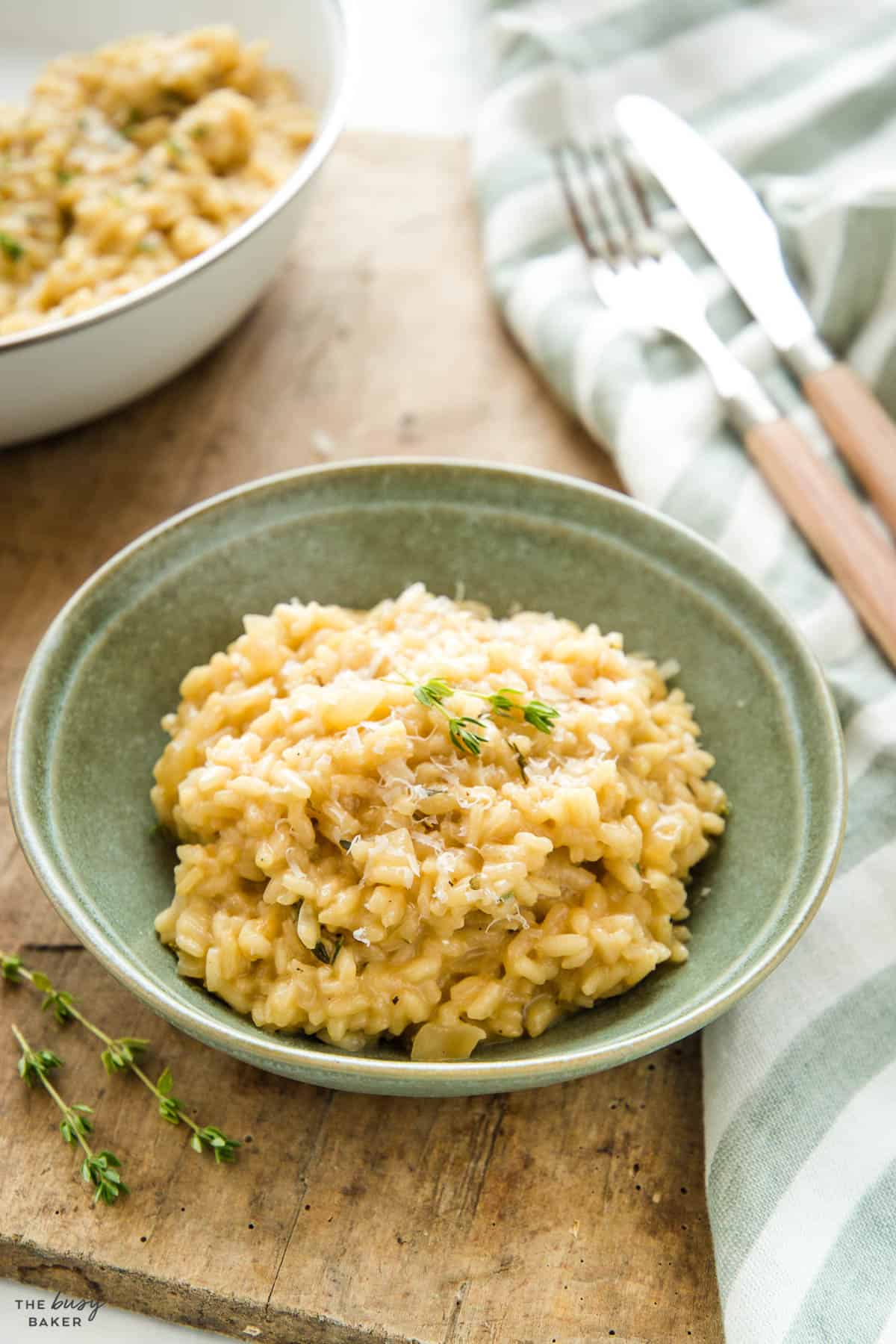 bowl of creamy rice with Parmeasn and thyme