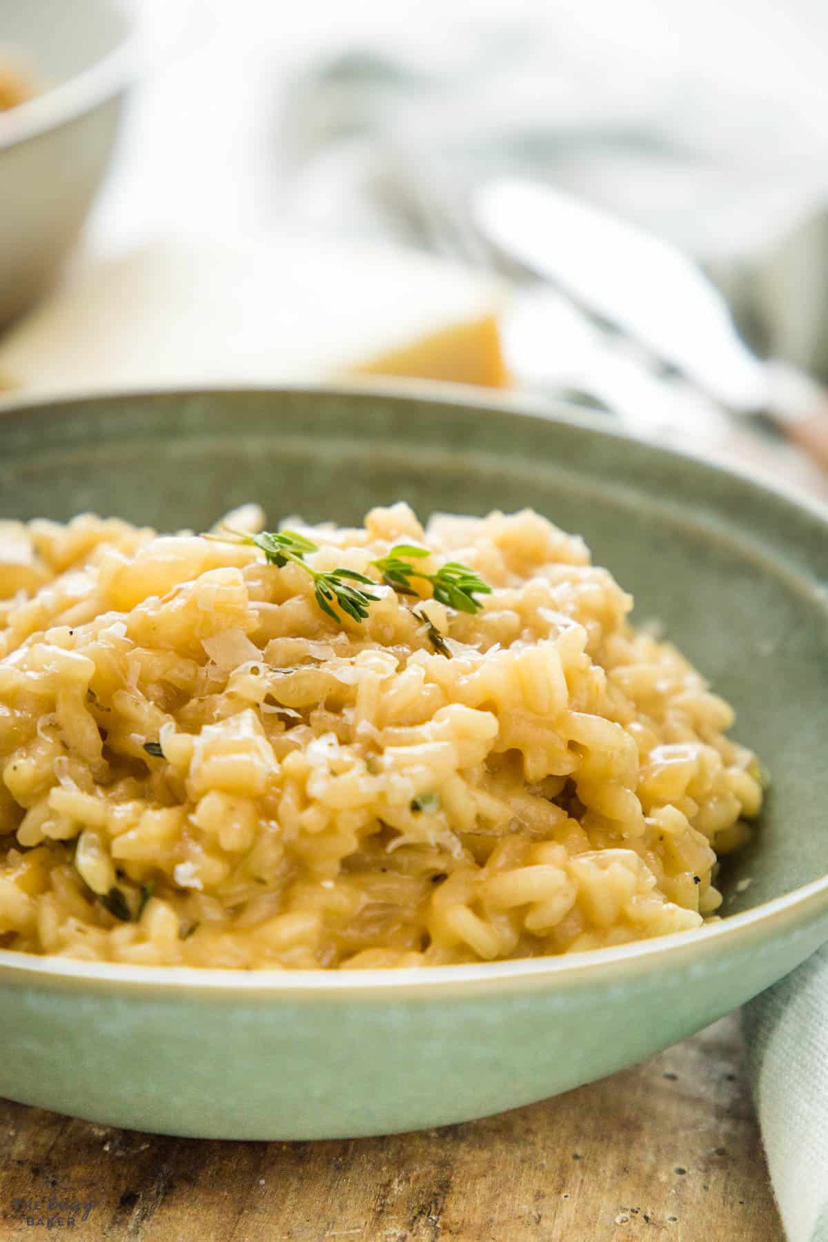 closeup image: risotto with fresh thyme and parmesan